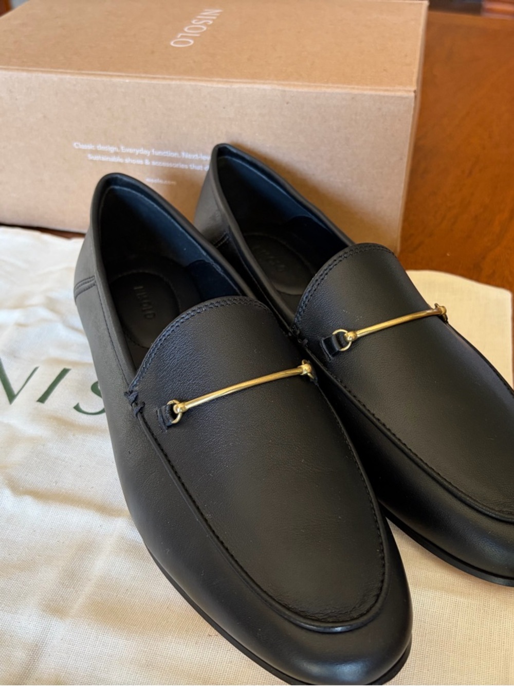 Nisolo Black Leather Lucy Loafers with Gold Bar Detail